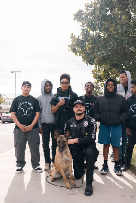 Students with K-9 Officer Maynard 